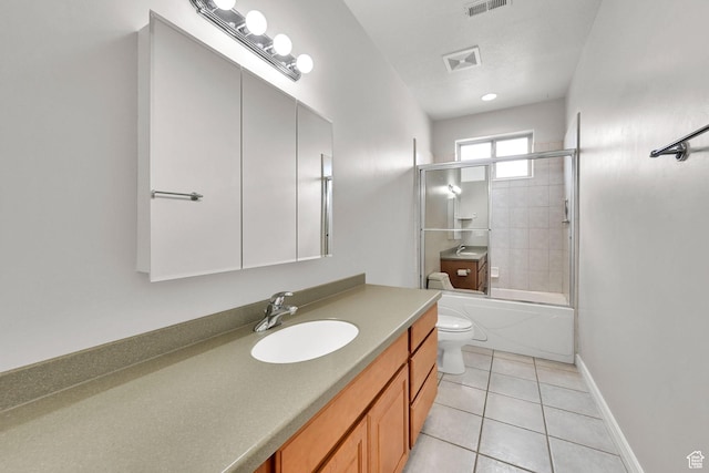337 S 300 E, Willard, UT 84340 - bathroom featuring toilet, vanity, tile patterned flooring, combined bath / shower with glass door, and baseboards