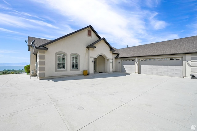 337 S 300 E, Willard, UT 84340 - french country inspired facade with a garage, driveway, stucco siding, and roof with shingles
