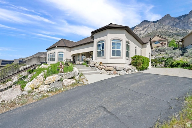 337 S 300 E, Willard, UT 84340 - view of front of house with stucco siding and a mountain view