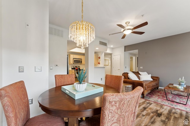 900 Bitner Rd Unit D11, Park City, UT 84098 - dining space with ceiling fan, a chandelier, and recessed lighting