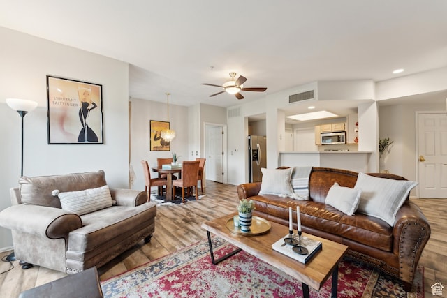900 Bitner Rd Unit D11, Park City, UT 84098 - living room with wood finished floors, ceiling fan, and recessed lighting