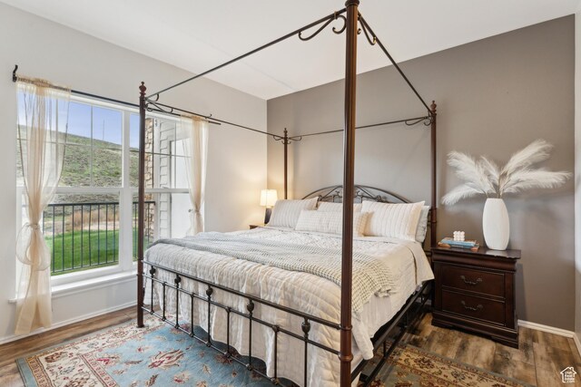 900 Bitner Rd Unit D11, Park City, UT 84098 - bedroom featuring baseboards and wood finished floors