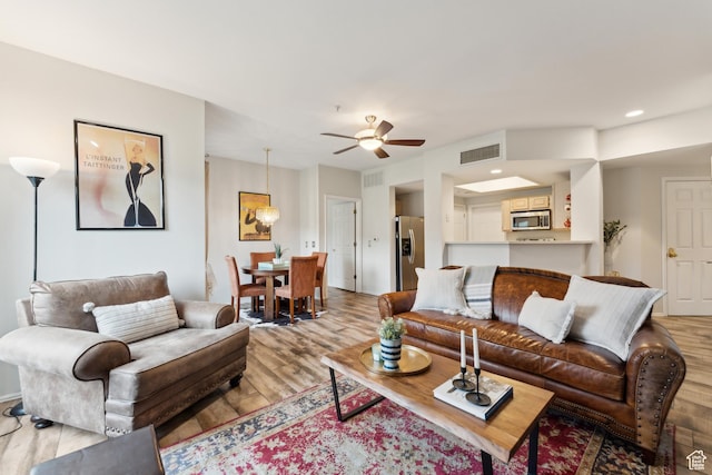 900 Bitner Rd Unit D11, Park City, UT 84098 - living room with wood finished floors, a ceiling fan, and recessed lighting