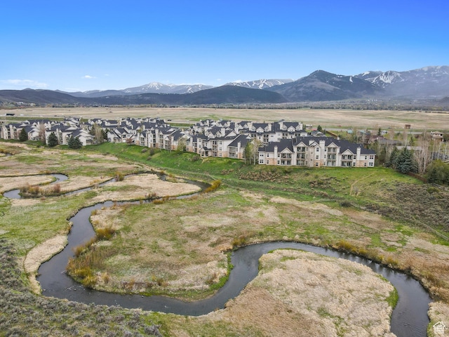 900 Bitner Rd Unit D11, Park City, UT 84098 - aerial view of property and surrounding area featuring nearby suburban area and a mountainous background