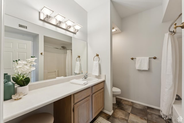 900 Bitner Rd Unit D11, Park City, UT 84098 - full bath featuring toilet, vanity, stone finish flooring, and baseboards