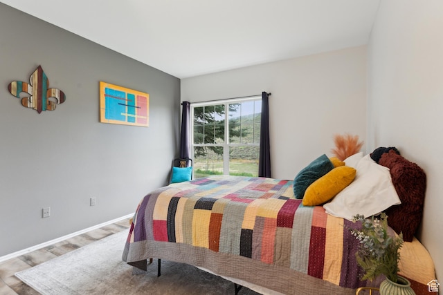 900 Bitner Rd Unit D11, Park City, UT 84098 - bedroom featuring wood finished floors and baseboards