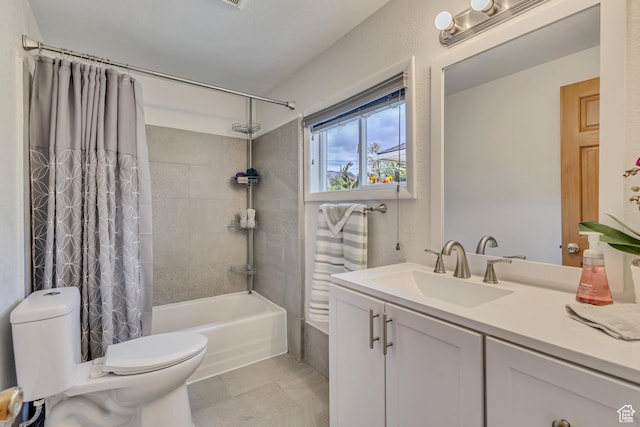 full bathroom with toilet, shower / bath combo with shower curtain, vanity, and tile patterned flooring