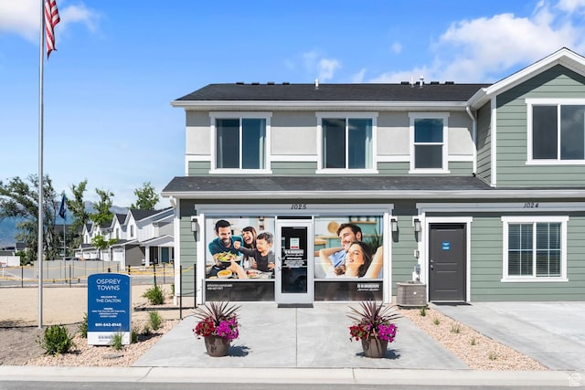 view of front of house with central AC unit