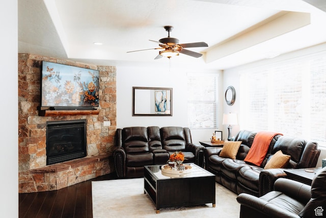 1866 N Matchstick Way, Cedar City, UT 84721 - living room with light wood-style floors, a fireplace, ceiling fan, and healthy amount of natural light