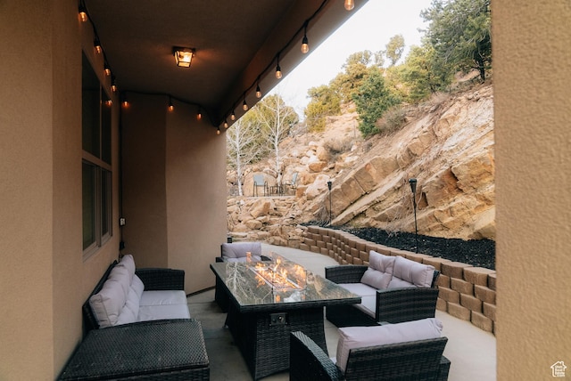 1866 N Matchstick Way, Cedar City, UT 84721 - view of patio / terrace with an outdoor living space with a fire pit
