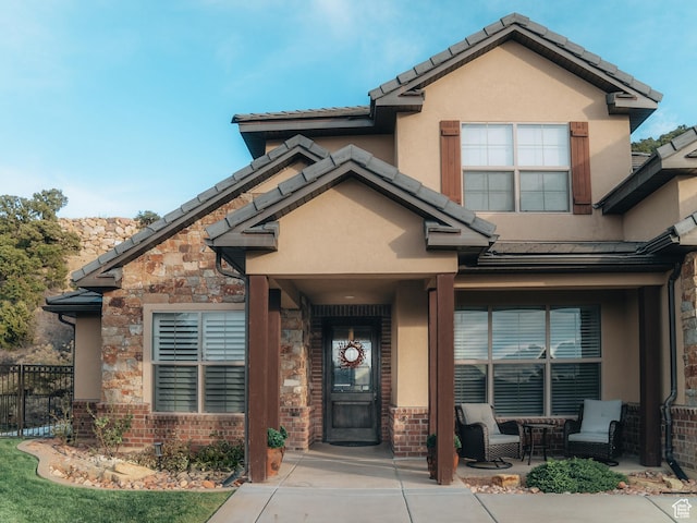 1866 N Matchstick Way, Cedar City, UT 84721 - craftsman inspired home with stucco siding, fence, stone siding, and a tiled roof