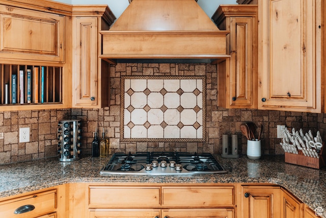 1866 N Matchstick Way, Cedar City, UT 84721 - kitchen featuring stainless steel gas stovetop, decorative backsplash, custom range hood, and dark countertops