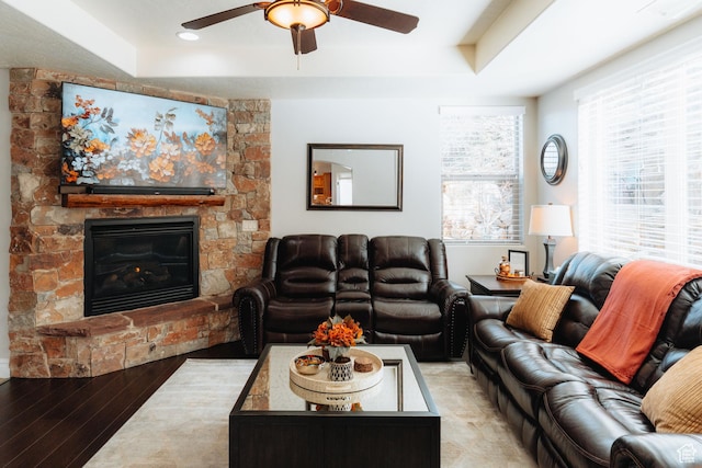 1866 N Matchstick Way, Cedar City, UT 84721 - living area featuring ceiling fan, a stone fireplace, light wood finished floors, a raised ceiling, and recessed lighting