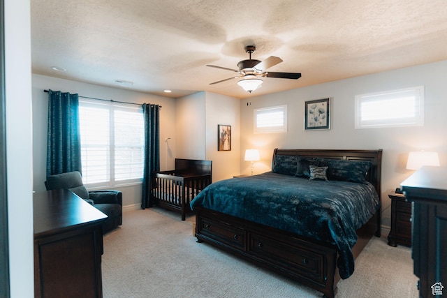 1866 N Matchstick Way, Cedar City, UT 84721 - bedroom featuring light colored carpet, baseboards, a textured ceiling, and ceiling fan