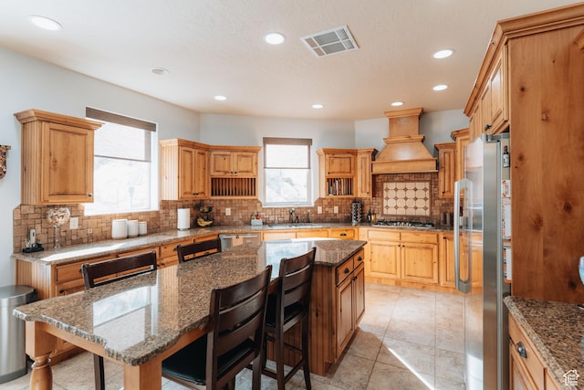 1866 N Matchstick Way, Cedar City, UT 84721 - kitchen with appliances with stainless steel finishes, plenty of natural light, a sink, backsplash, and recessed lighting