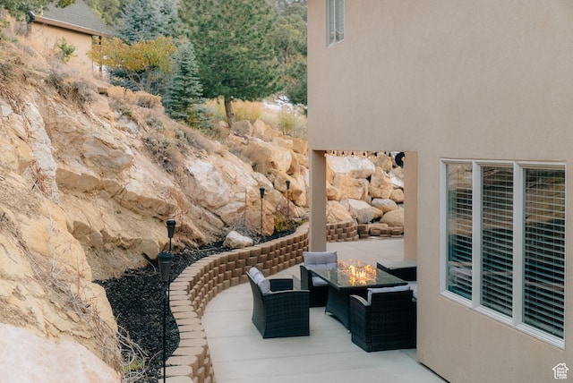 1866 N Matchstick Way, Cedar City, UT 84721 - view of patio with an outdoor living space with a fire pit