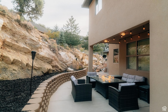 1866 N Matchstick Way, Cedar City, UT 84721 - view of patio / terrace with an outdoor living space with a fire pit