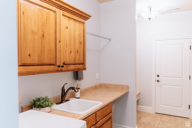 1866 N Matchstick Way, Cedar City, UT 84721 - clothes washing area featuring cabinet space and light tile patterned floors