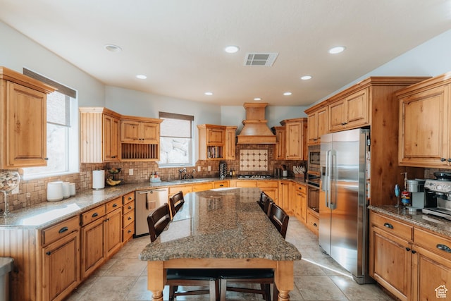 1866 N Matchstick Way, Cedar City, UT 84721 - kitchen with stainless steel appliances, premium range hood, a sink, backsplash, and recessed lighting