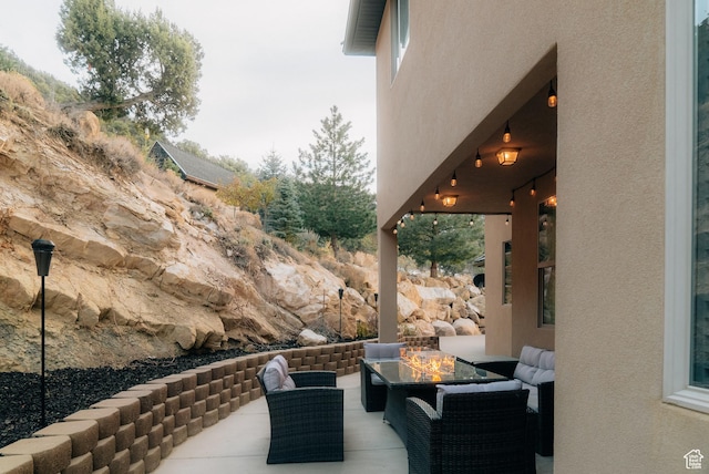 1866 N Matchstick Way, Cedar City, UT 84721 - view of patio featuring an outdoor living space with a fire pit