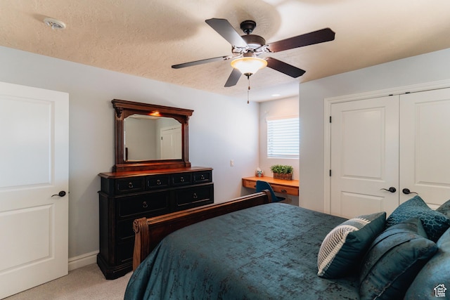 1866 N Matchstick Way, Cedar City, UT 84721 - bedroom with light carpet, a closet, ceiling fan, and baseboards