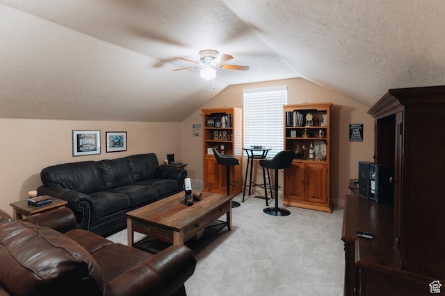 1866 N Matchstick Way, Cedar City, UT 84721 - living room featuring light carpet, lofted ceiling, a ceiling fan, and a textured ceiling