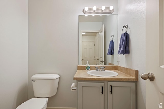 half bath with toilet and vanity