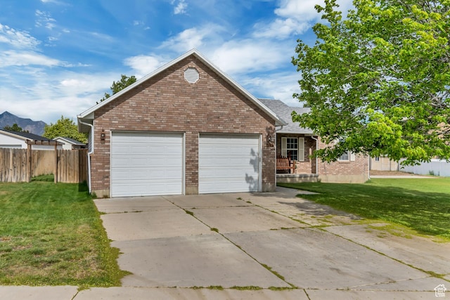 view of front facade with brick siding, concrete driveway, and an attached garage