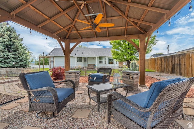 view of patio / terrace with a gazebo and a fenced backyard