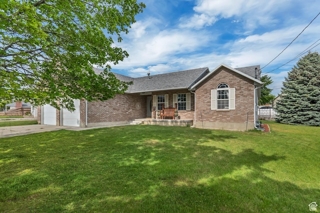 ranch-style house featuring brick siding, a front lawn, concrete driveway, and a porch