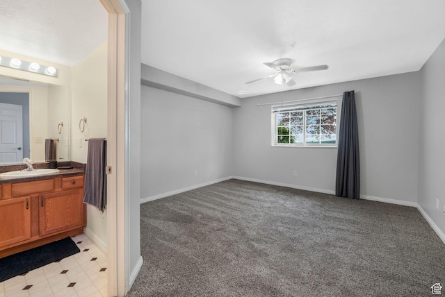 1693 W Westbury Unit D, Lehi, UT 84043 - bathroom with a ceiling fan, baseboards, and vanity