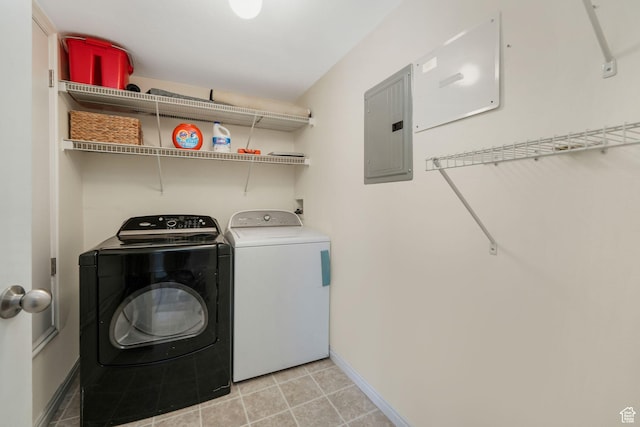 1693 W Westbury Unit D, Lehi, UT 84043 - clothes washing area featuring electric panel, washer and clothes dryer, baseboards, and light tile patterned flooring