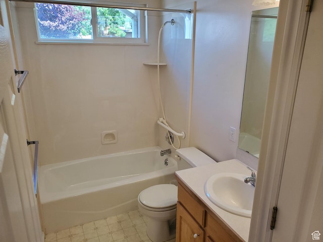 bathroom with toilet, bathing tub / shower combination, and vanity