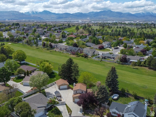 aerial view of residential area with mountains