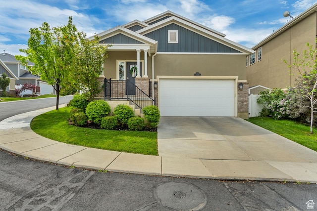 238 E Hillcrest Way N, Salt Lake, UT 84054 - craftsman inspired home featuring concrete driveway, stucco siding, board and batten siding, and a garage