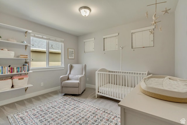 238 E Hillcrest Way N, Salt Lake, UT 84054 - bedroom featuring a nursery area, baseboards, and carpet