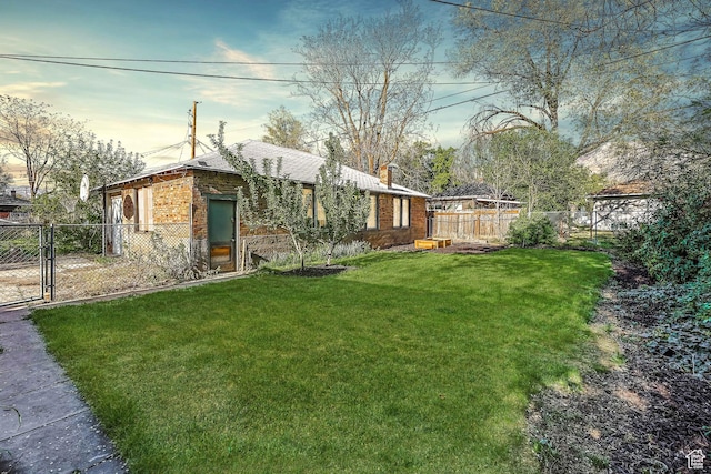 view of yard featuring a gate