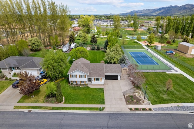 aerial view of residential area with a mountainous background