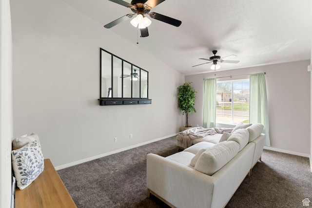 carpeted living room with a ceiling fan and baseboards