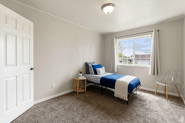 carpeted bedroom with baseboards