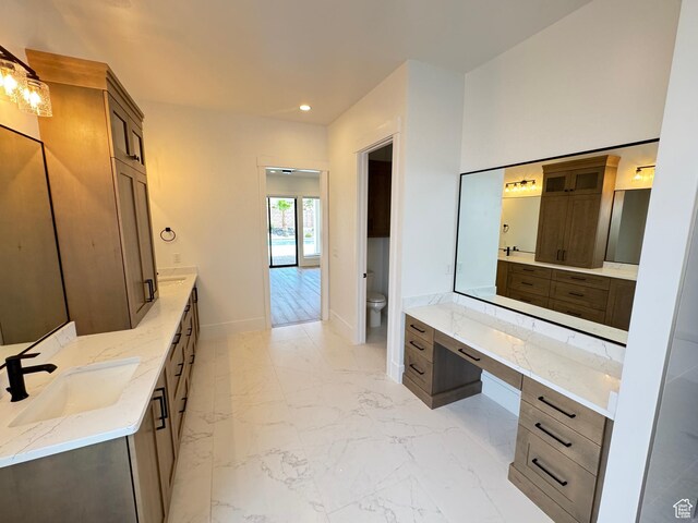 full bathroom with toilet, baseboards, recessed lighting, vanity, and marble finish floors