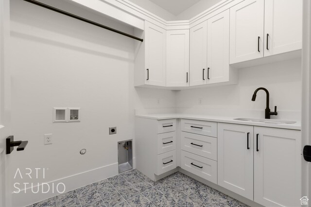 2832 E Stonedale Dr, St George, UT 84790 - laundry room featuring hookup for an electric dryer, washer hookup, cabinet space, light floors, and gas dryer hookup