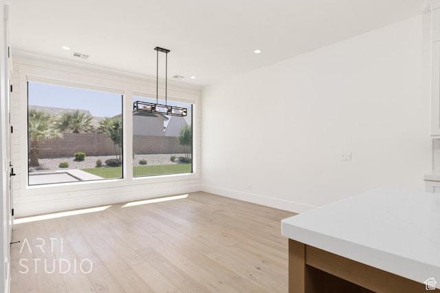 2832 E Stonedale Dr, St George, UT 84790 - unfurnished dining area featuring light wood finished floors, baseboards, a chandelier, and recessed lighting