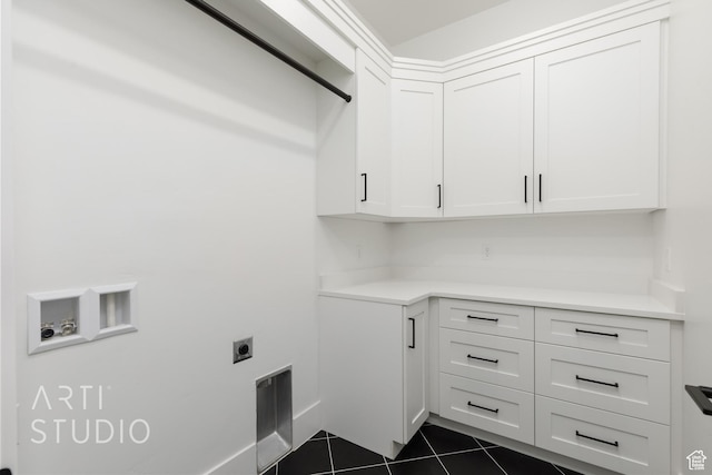 2832 E Stonedale Dr, St George, UT 84790 - laundry area with cabinet space, electric dryer hookup, dark tile patterned flooring, and hookup for a washing machine