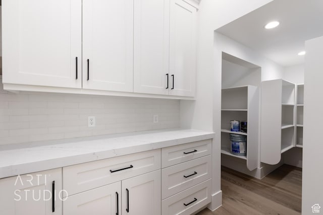 2832 E Stonedale Dr, St George, UT 84790 - kitchen with white cabinetry, light wood-type flooring, backsplash, and recessed lighting