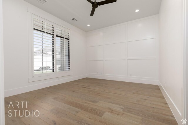 2832 E Stonedale Dr, St George, UT 84790 - spare room featuring ceiling fan, light wood-style floors, recessed lighting, baseboards, and a decorative wall
