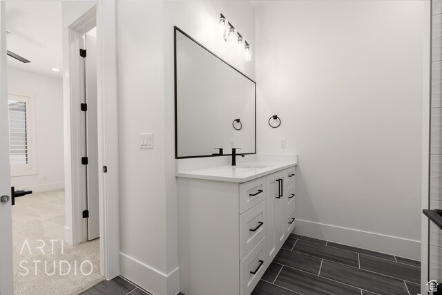 2832 E Stonedale Dr, St George, UT 84790 - bathroom with baseboards and vanity