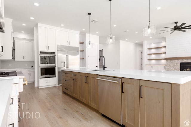 2832 E Stonedale Dr, St George, UT 84790 - kitchen featuring stainless steel appliances, a ceiling fan, recessed lighting, light wood finished floors, and open shelves