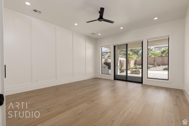 2832 E Stonedale Dr, St George, UT 84790 - spare room featuring light wood-style floors, a decorative wall, recessed lighting, and ceiling fan