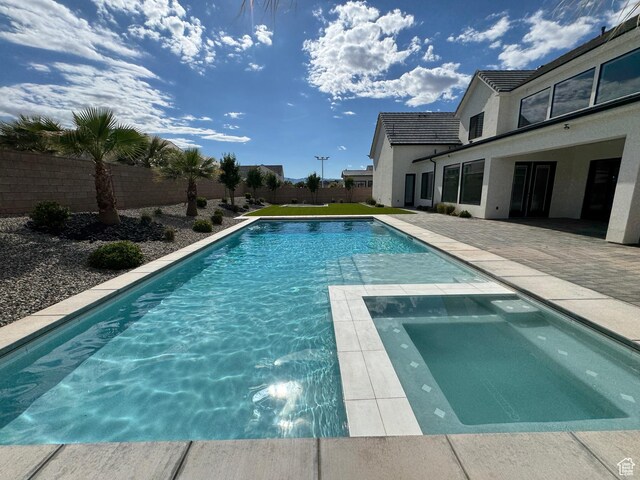 2832 E Stonedale Dr, St George, UT 84790 - view of pool with a fenced backyard, a patio area, and a pool with connected hot tub